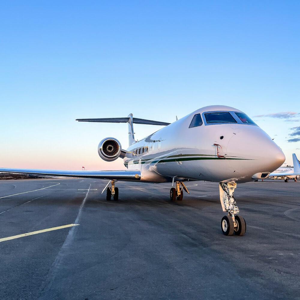 Private business jet on an airport apron