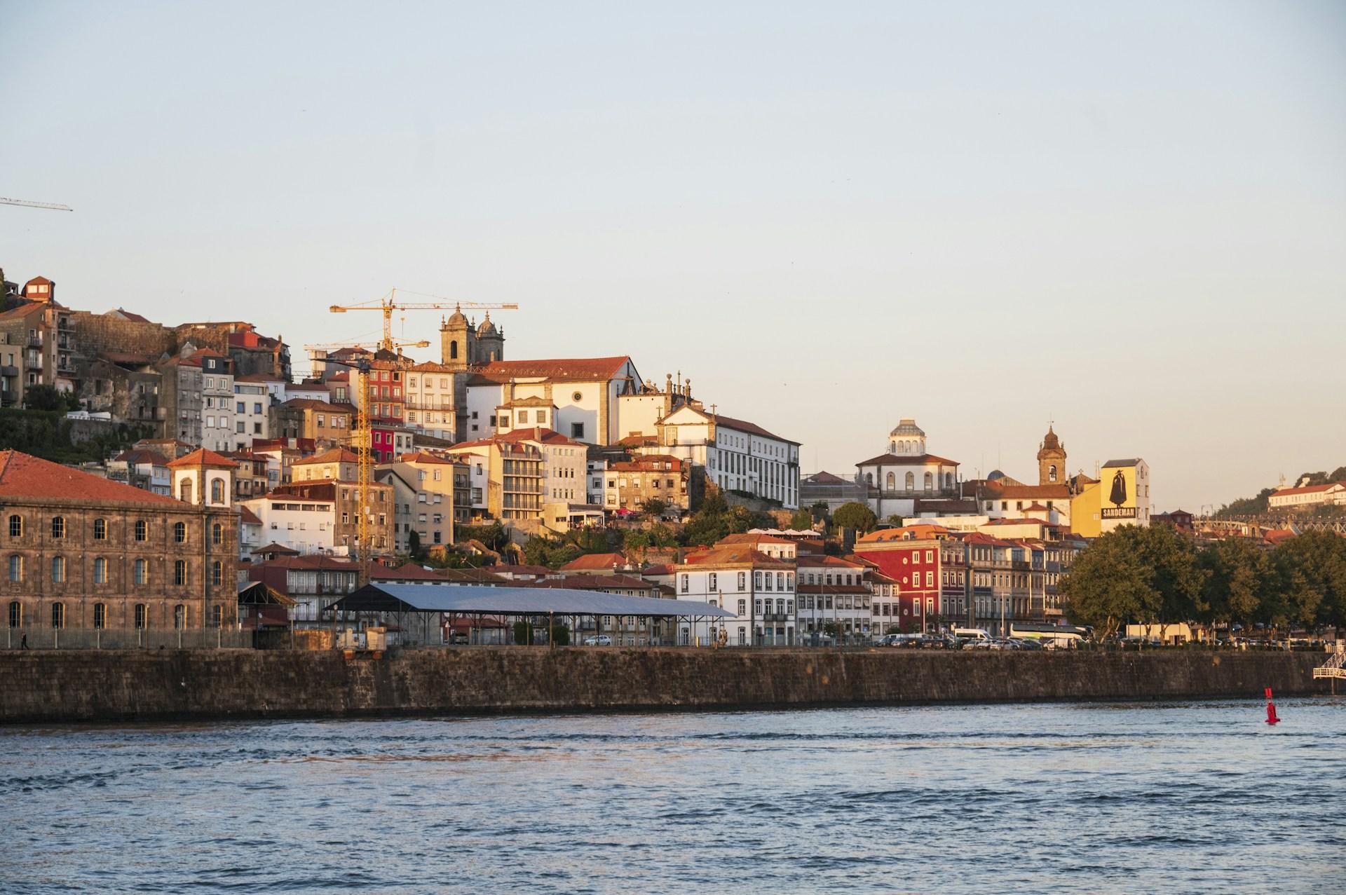 Vila Nova de Gaia waterfront on the Douro River at sunset, Portugal