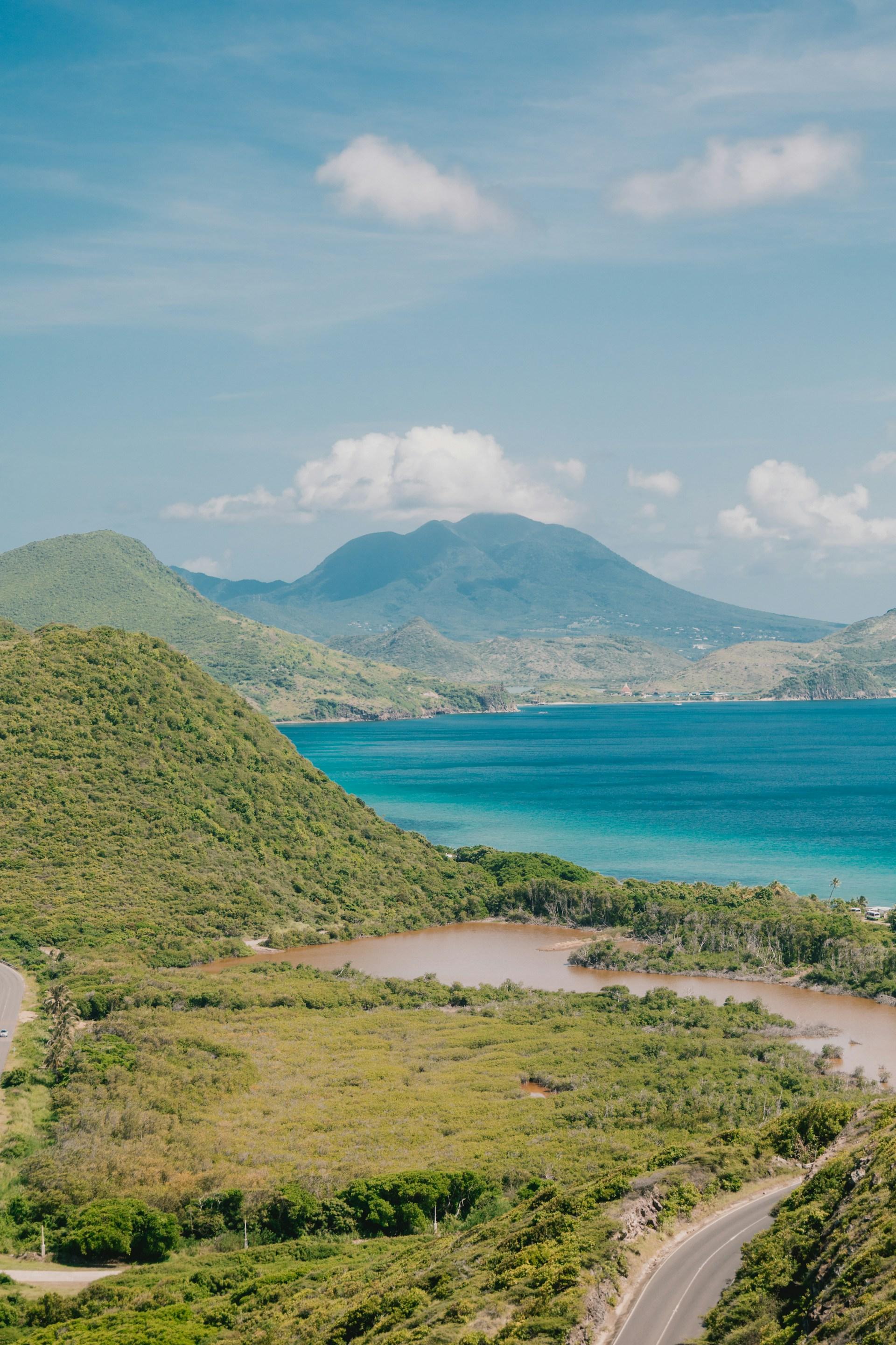 Green hills above the blue Caribbean Sea in St Kitts and Nevis